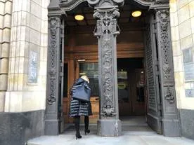Delegation members walks into justice building